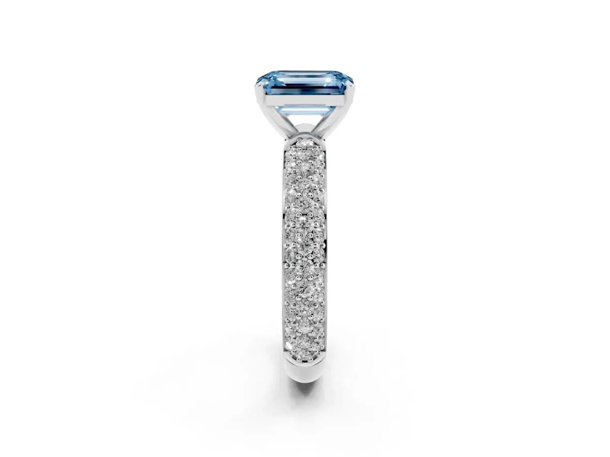 Fancy Blue Emerald Cut Diamond Solitaire Ring with Prong Setting and Pavé Band Silver