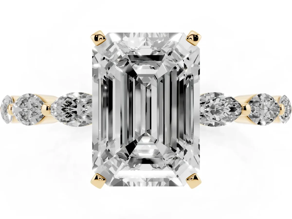 Emerald Cut Diamond Ring with Marquise Side Stones and Prong Setting Yellow gold