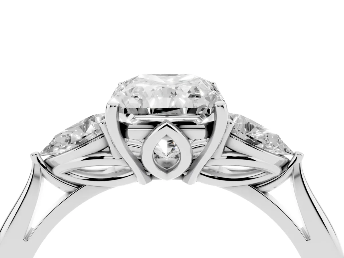 Three-Stone Radiant Cut Diamond Ring with Pear Side Stones in Four-Prong Setting Silver