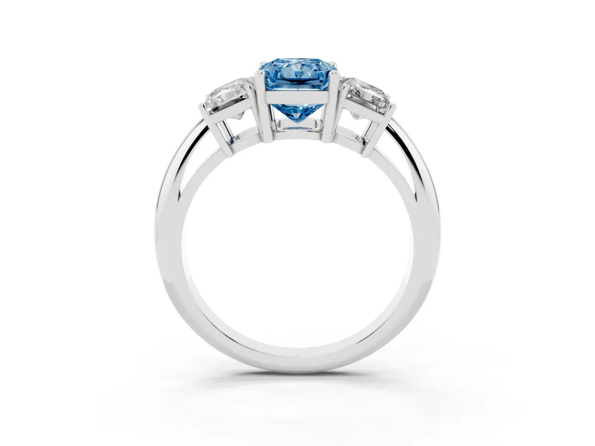 Fancy Blue Three-Stone Radiant Cut Cut Diamond Engagement Ring with Prong Setting on a White Gold Band Silver
