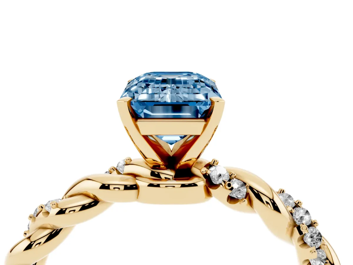 Fancy Blue Emerald Cut Diamond Solitaire Ring with Twisted Band and Pavé Accents Yellow gold
