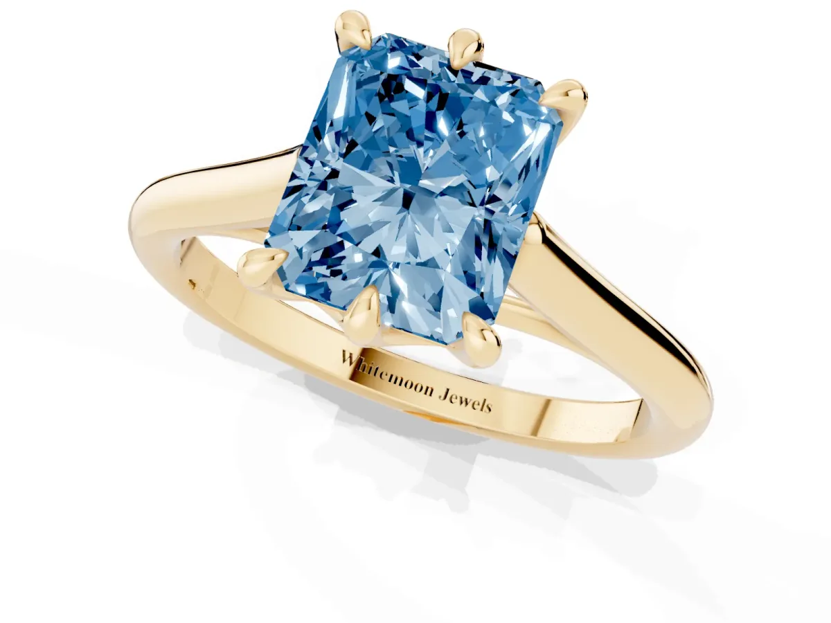 Fancy Blue Radiant Cut Solitaire Engagement Ring with Six-Prong Setting and Classic Band Yellow gold
