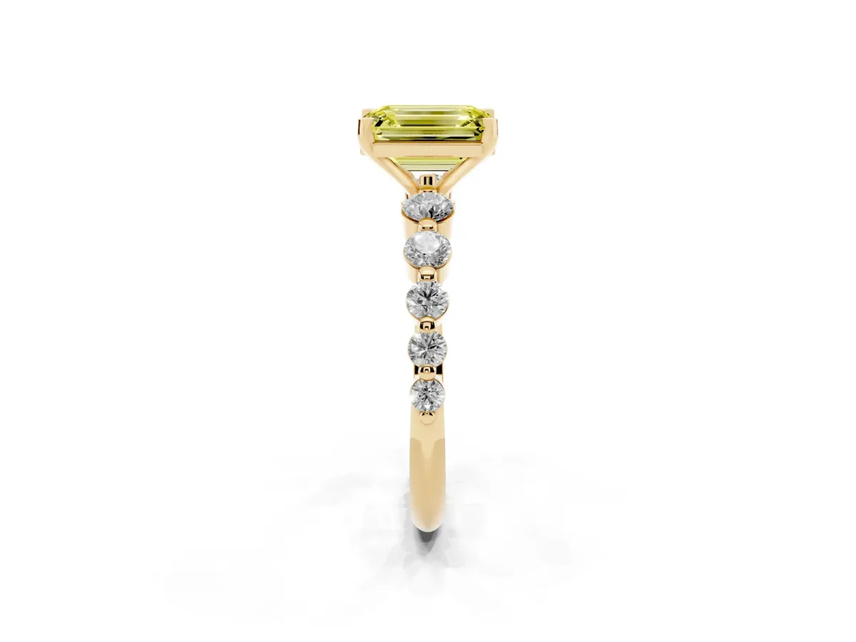 Fancy Yellow Emerald Cut Solitaire Diamond Ring with Pave Band and Four-Prong Setting Yellow gold