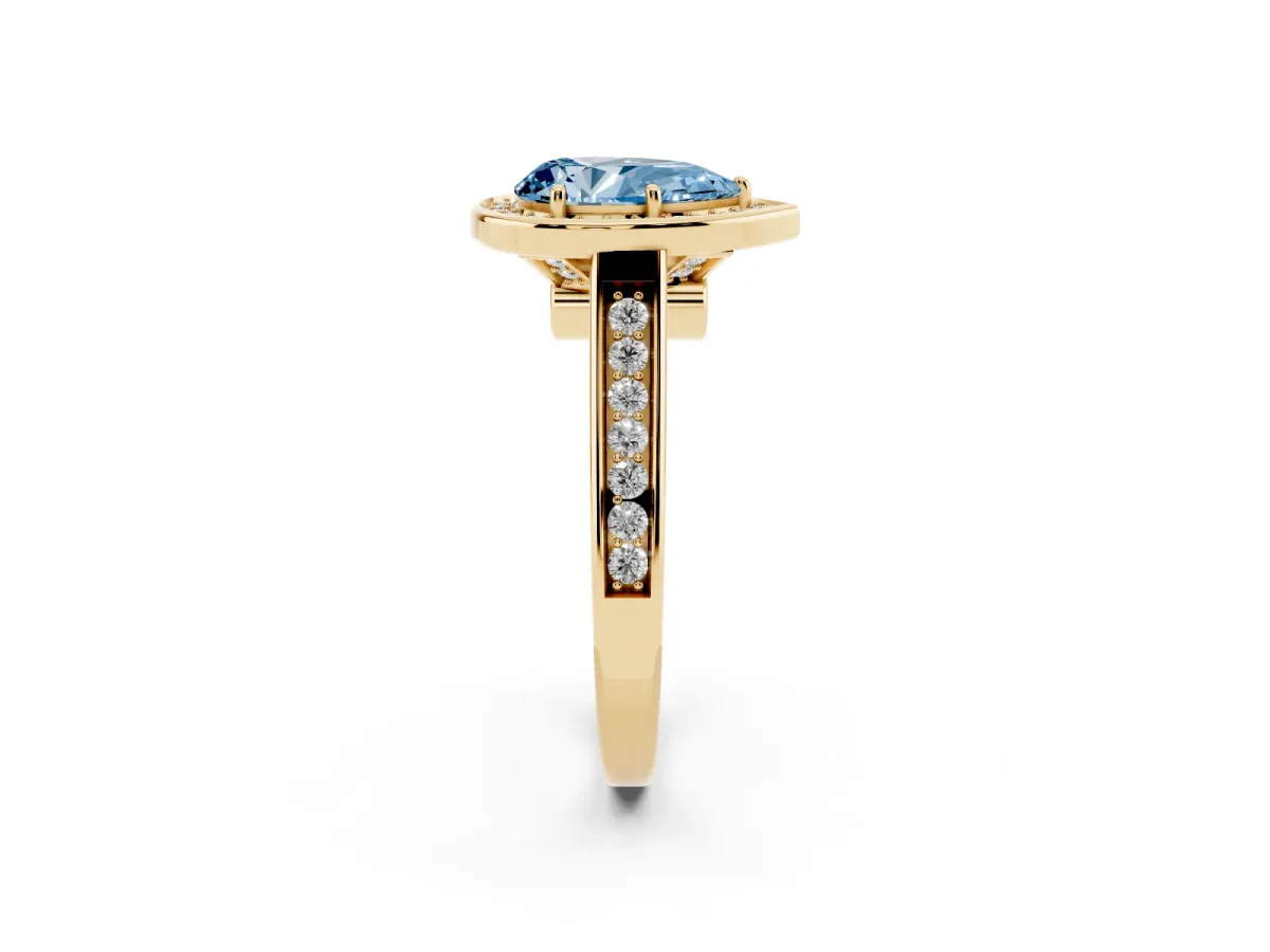 Fancy Blue Pear Cut Halo Solitaire Diamond Ring with Pave Band and Bezel Setting Yellow gold