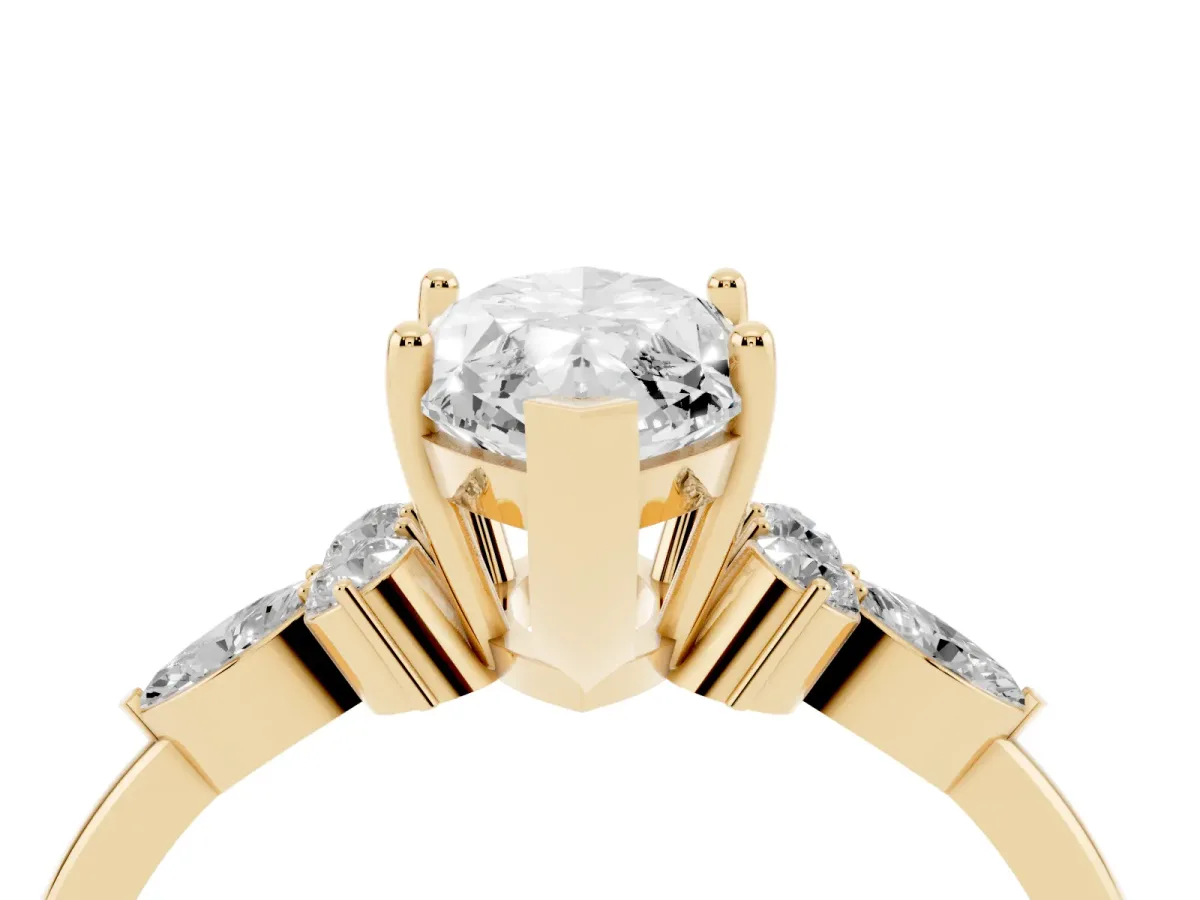 Marquise Cut Brilliant Diamond Solitaire Ring with Pear Side Stones and Four-Prong Setting Yellow gold