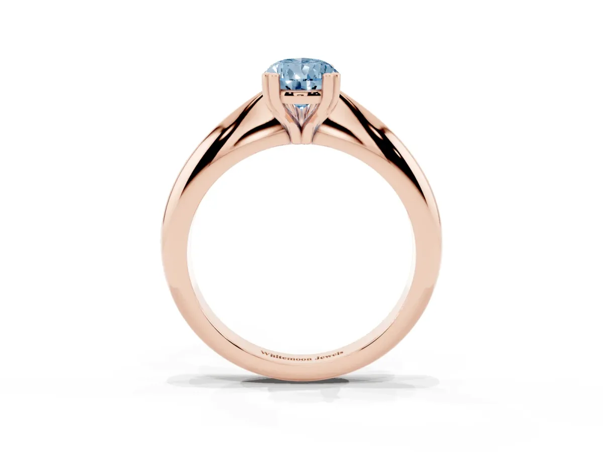 Fancy Blue Pear Cut Cut Solitaire Engagement Ring with Tapered Band and Four-Prong Setting Rose gold