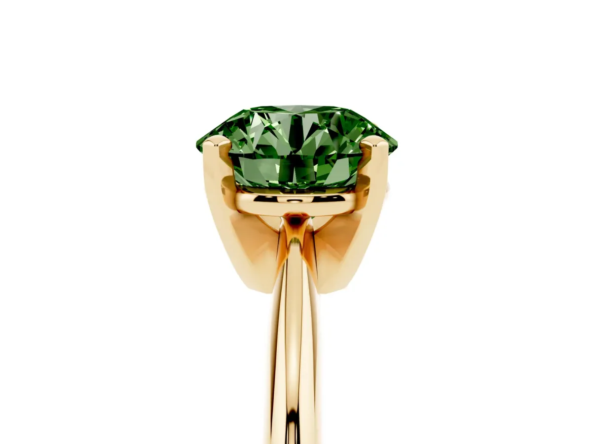 Fancy Green Round Cut Cut Solitaire Ring with Four-Prong Setting on a Classic Band Yellow gold