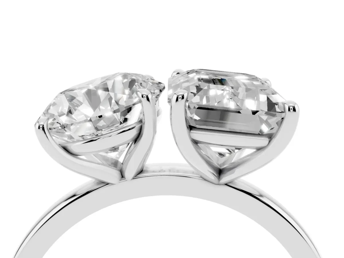 Round Cut and Emerald Cut Toi Moi Ring with Prong Setting Platinum