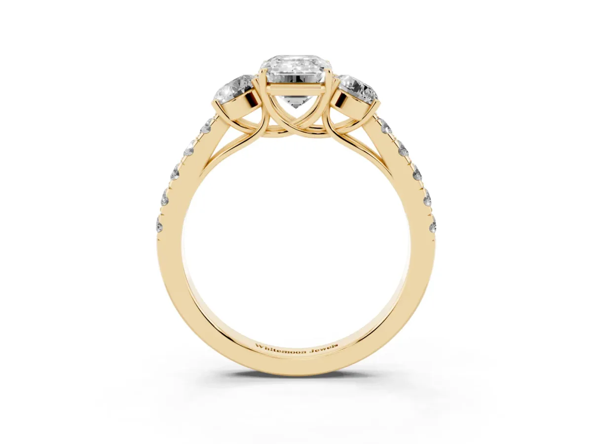 Emerald Cut Cut Diamond Three-Stone Ring with Round Side Stones and Pavé Band Yellow gold