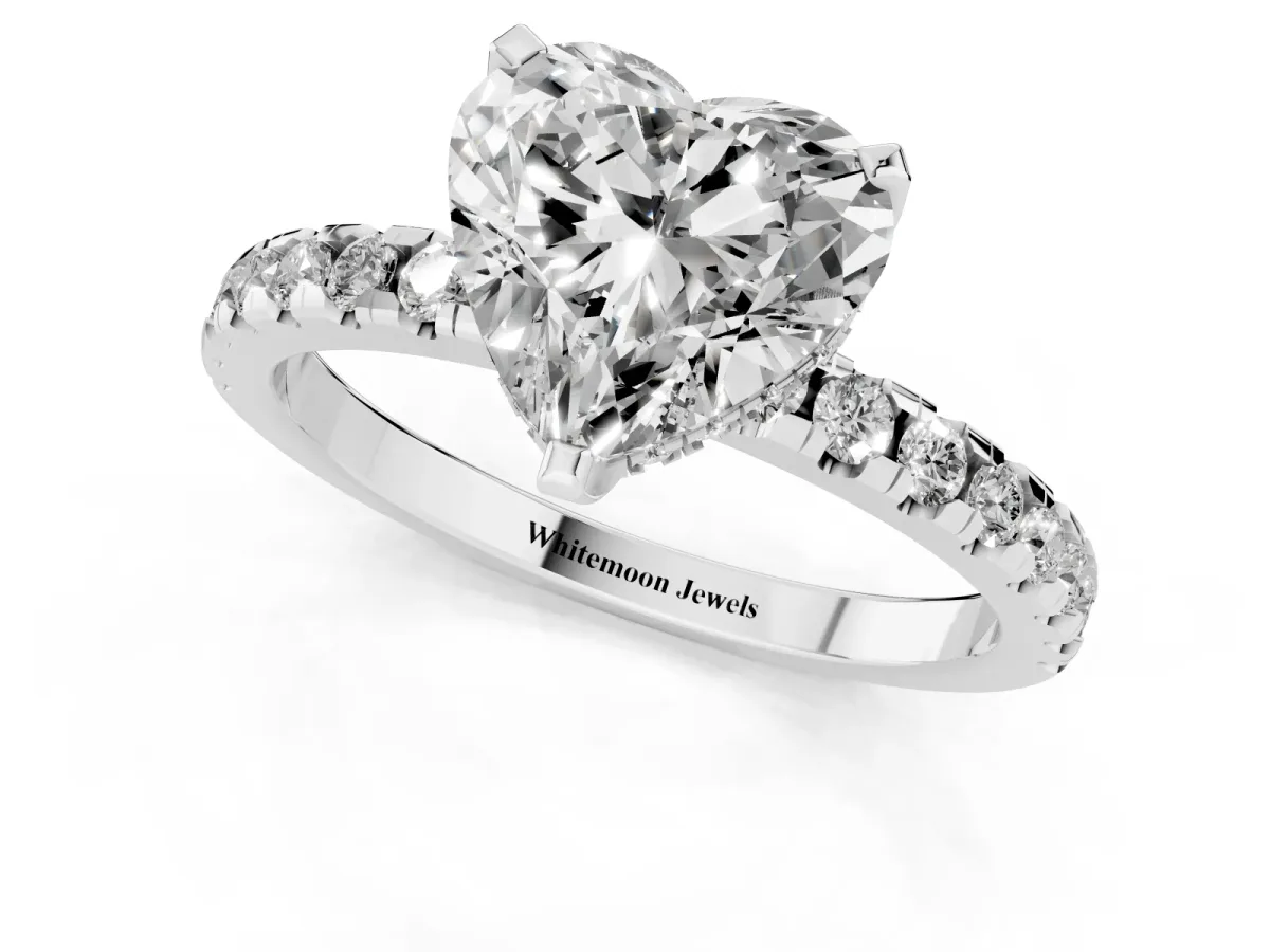 Heart Cut Diamond Solitaire Ring with Round Pavé Band and Four-Prong Setting Silver