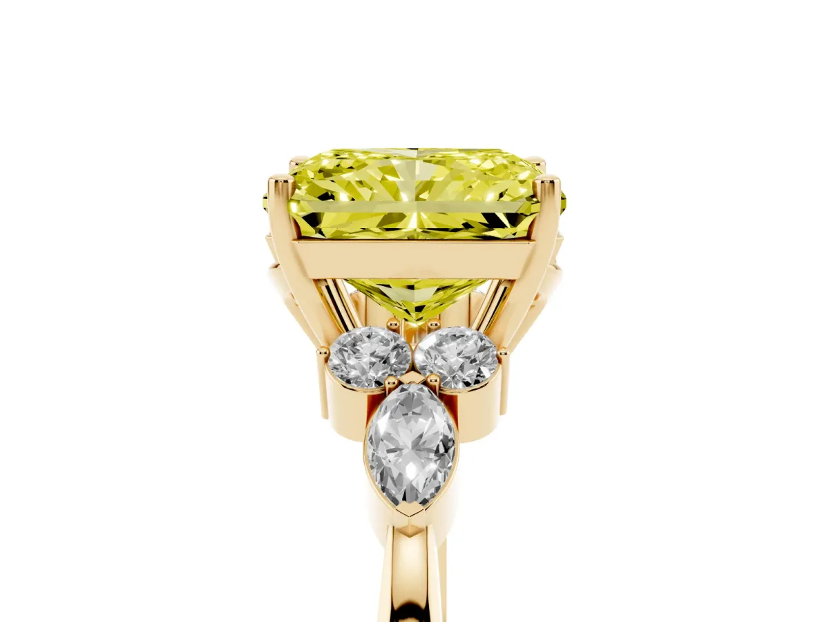 Fancy Yellow Radiant Cut Brilliant Diamond Solitaire Ring with Pear Side Stones and Four-Prong Setting Yellow gold