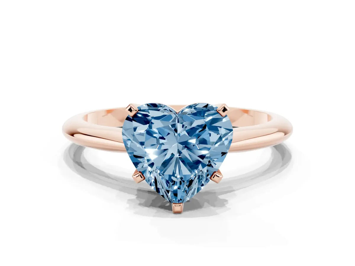 Fancy Blue Heart Cut Cut Solitaire Ring with Four-Prong Setting on a Classic Band Rose gold