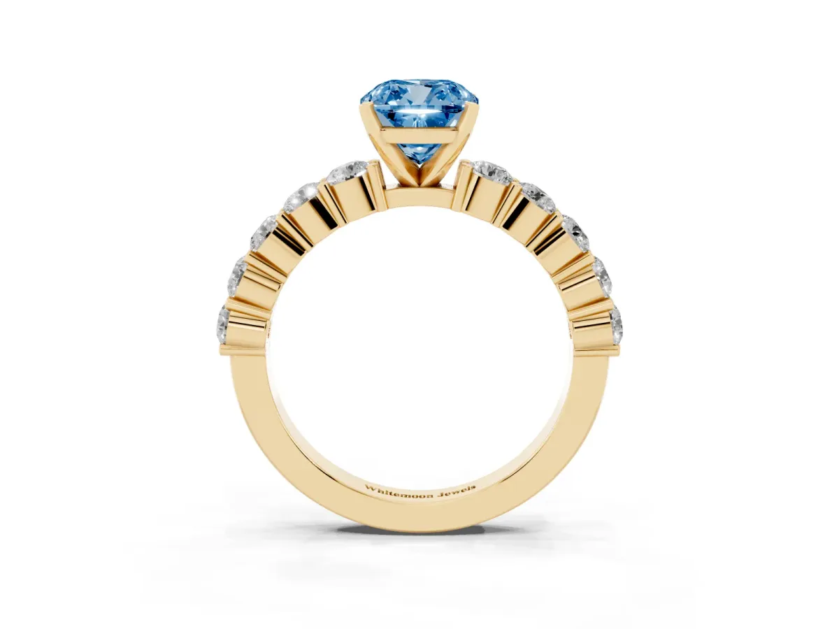 Fancy Blue Cushion Cut Diamond Solitaire Ring with Shared Prong Round Side Stones Yellow gold