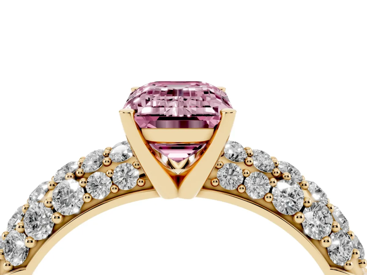 Fancy Pink Emerald Cut Diamond Pavé Band Solitaire Ring with Four-Prong Setting Yellow gold