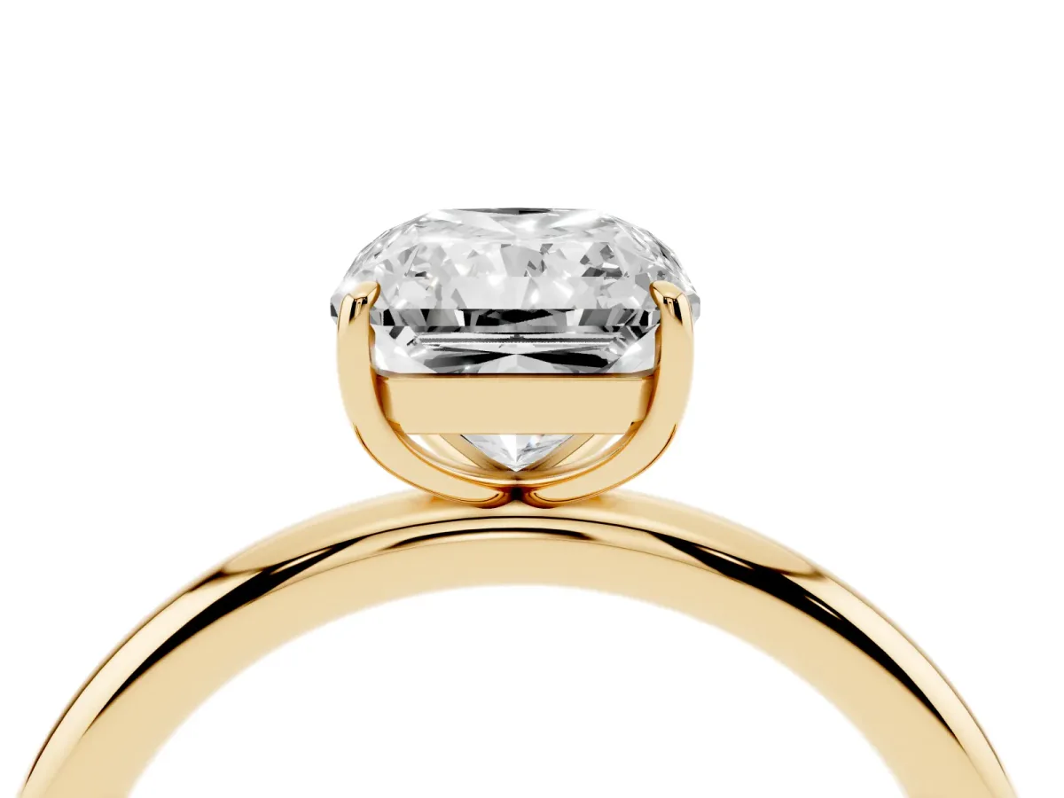 Radiant Cut Solitaire Diamond Ring with Four-Prong Setting on a Plain Band Yellow gold