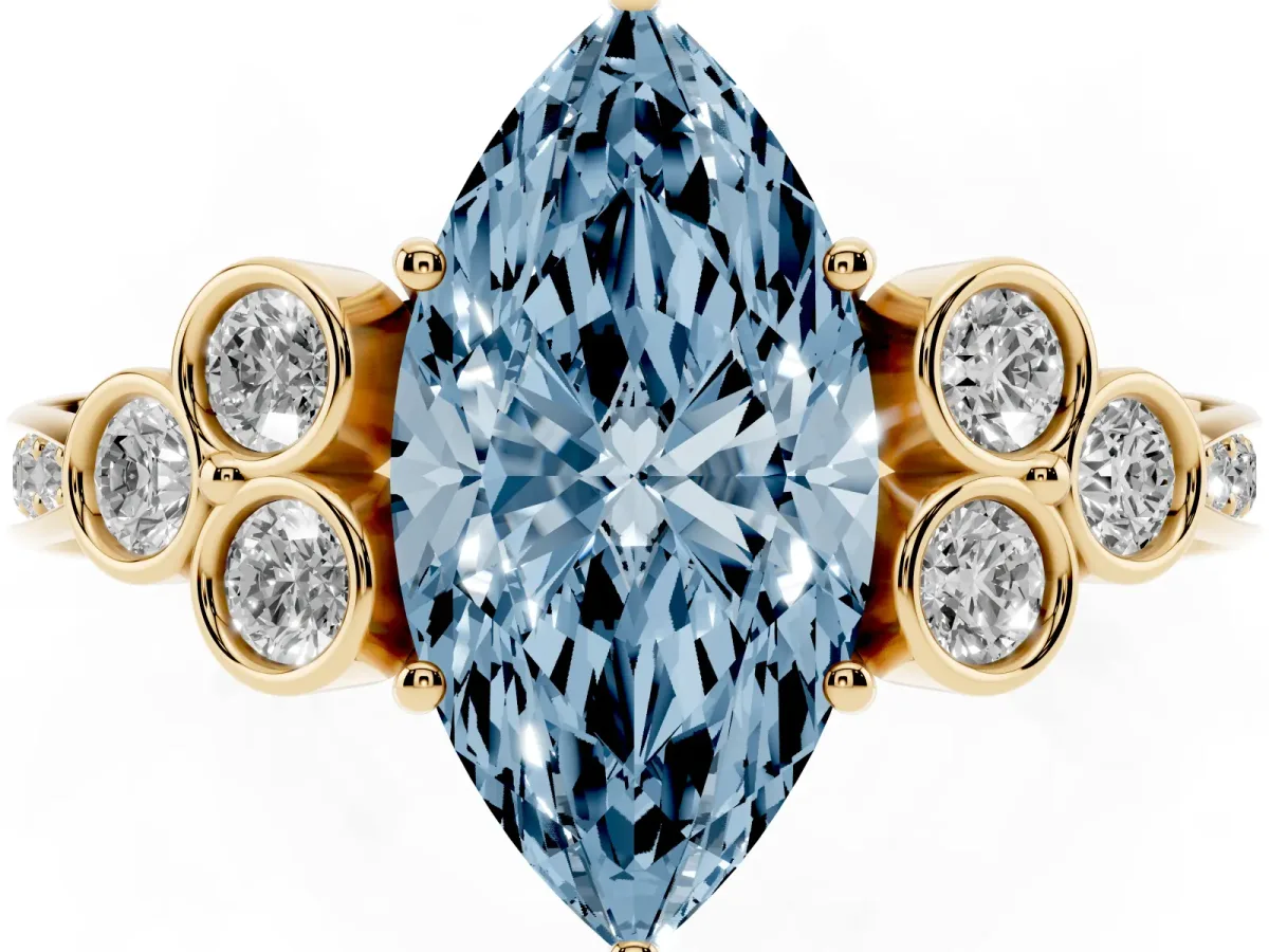 Fancy Blue Marquise Cut Cut Diamond Engagement Ring with Bezel Set Round Side Stones and Prong Setting Yellow gold