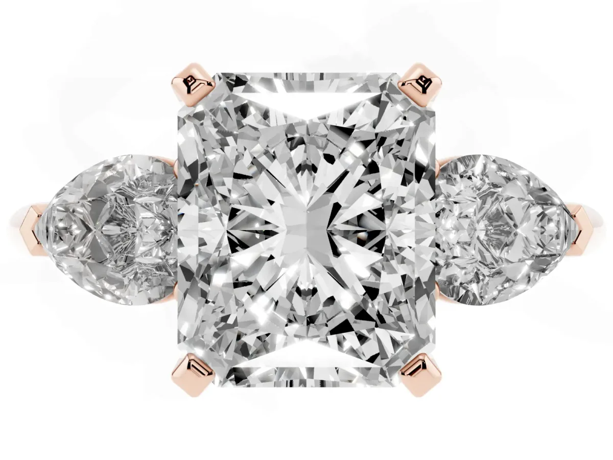 Three-Stone Radiant Cut Diamond Ring with Pear Side Stones and Four-Prong Setting Rose gold