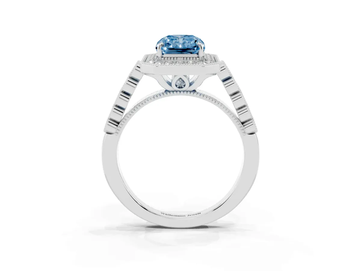 Fancy Blue Radiant Cut Halo Milgrain Solitaire with Bezel Set Side Stones and Pave Band White gold