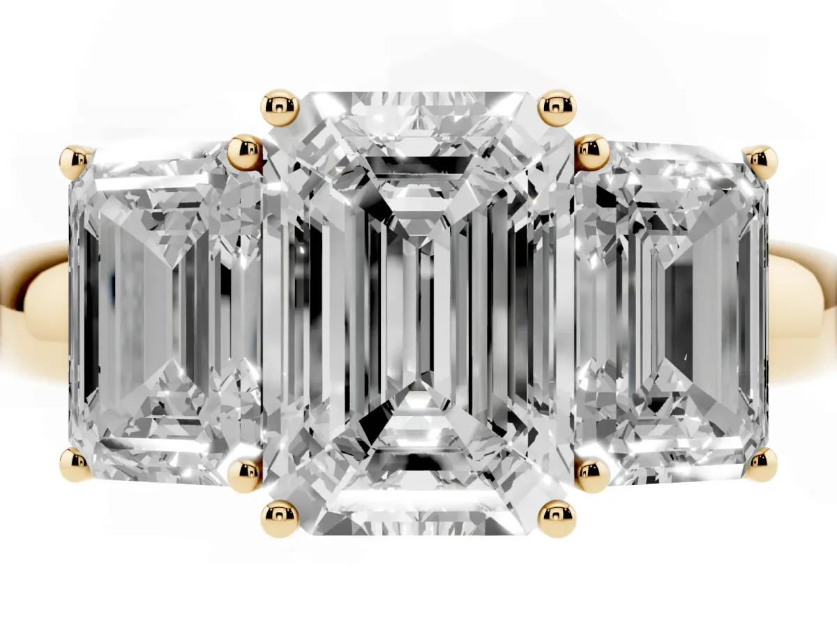 Emerald Cut Diamond Three-Stone Ring with Four-Prong Setting and Classic Band Yellow gold