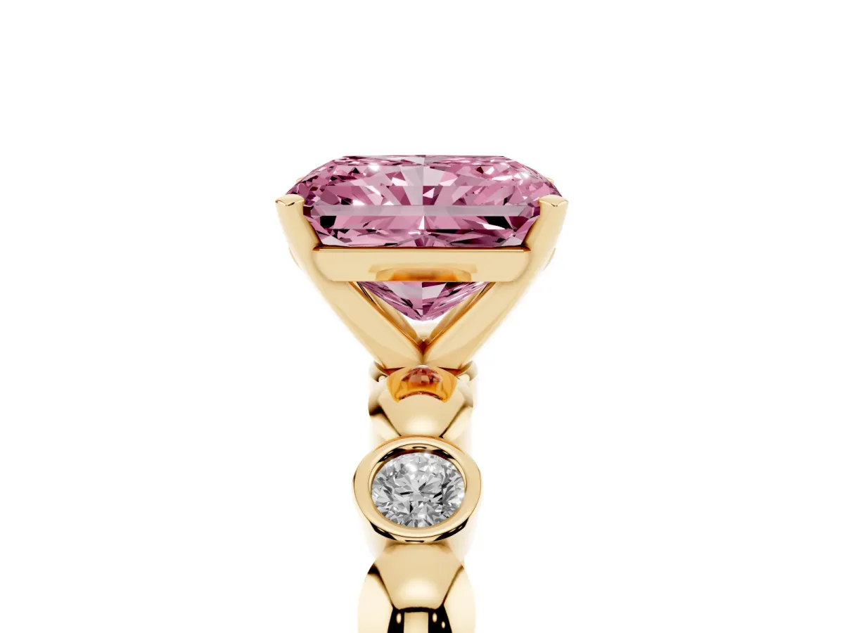 Fancy Pink Radiant Cut Solitaire Bezel-Set Diamond Ring with Beaded Band and Four-Prong Setting Yellow gold
