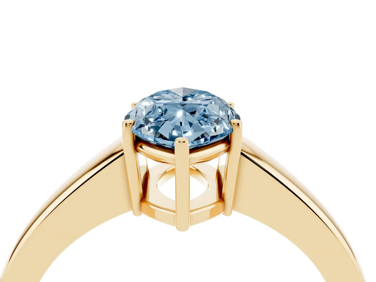 Fancy Blue Marquise Cut Solitaire Diamond Ring with Tapered Band and Four-Prong Setting Yellow gold