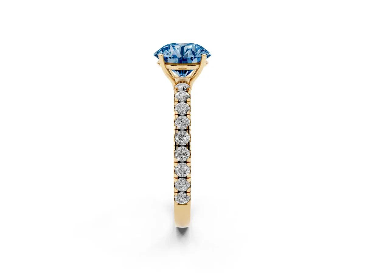 Fancy Blue Round Cut Diamond Pavé Solitaire Engagement Ring with Four-Prong Setting Yellow gold