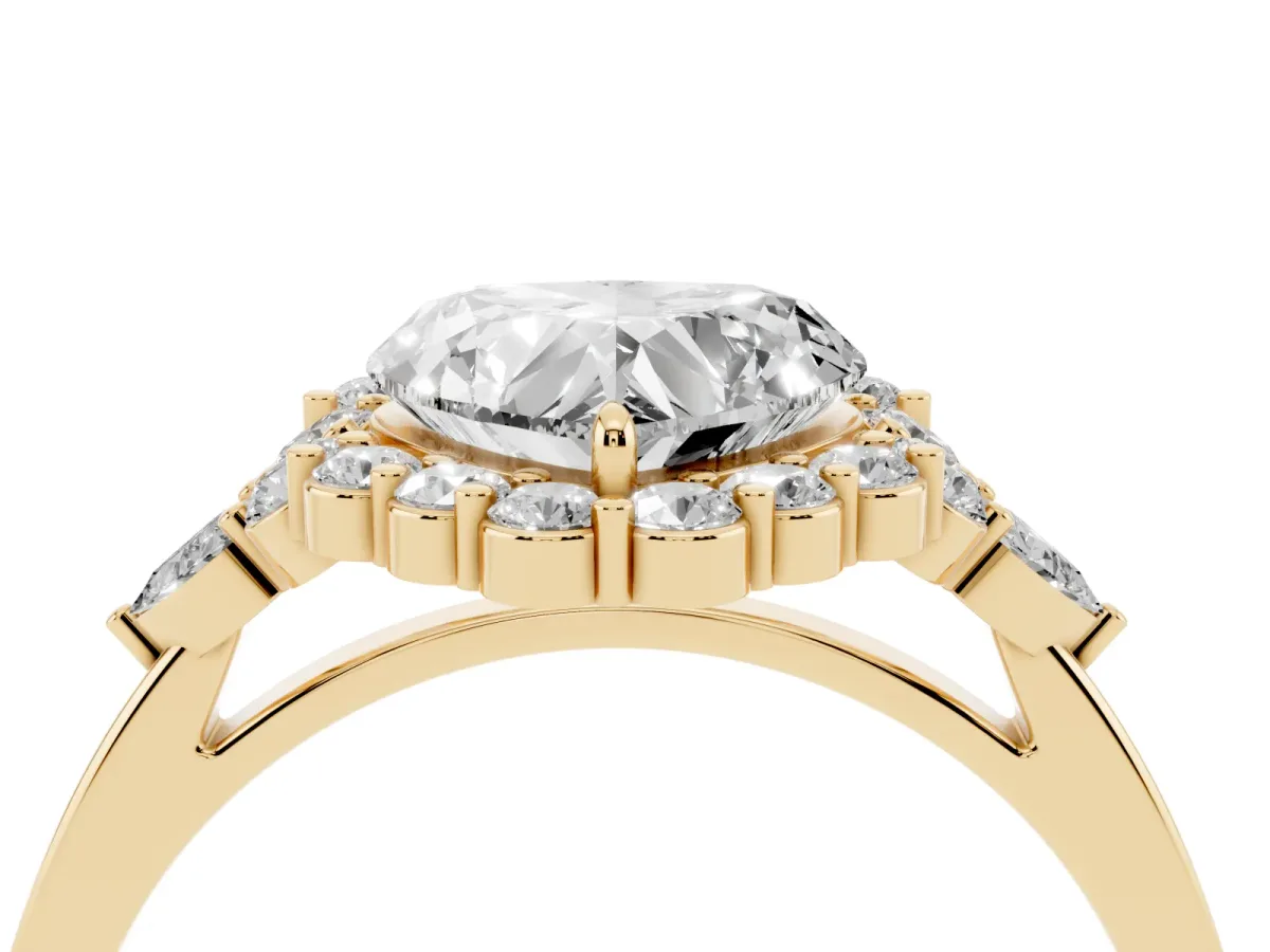 Heart Cut Diamond Halo Ring with Pear Side Stones and Prong Setting Yellow gold