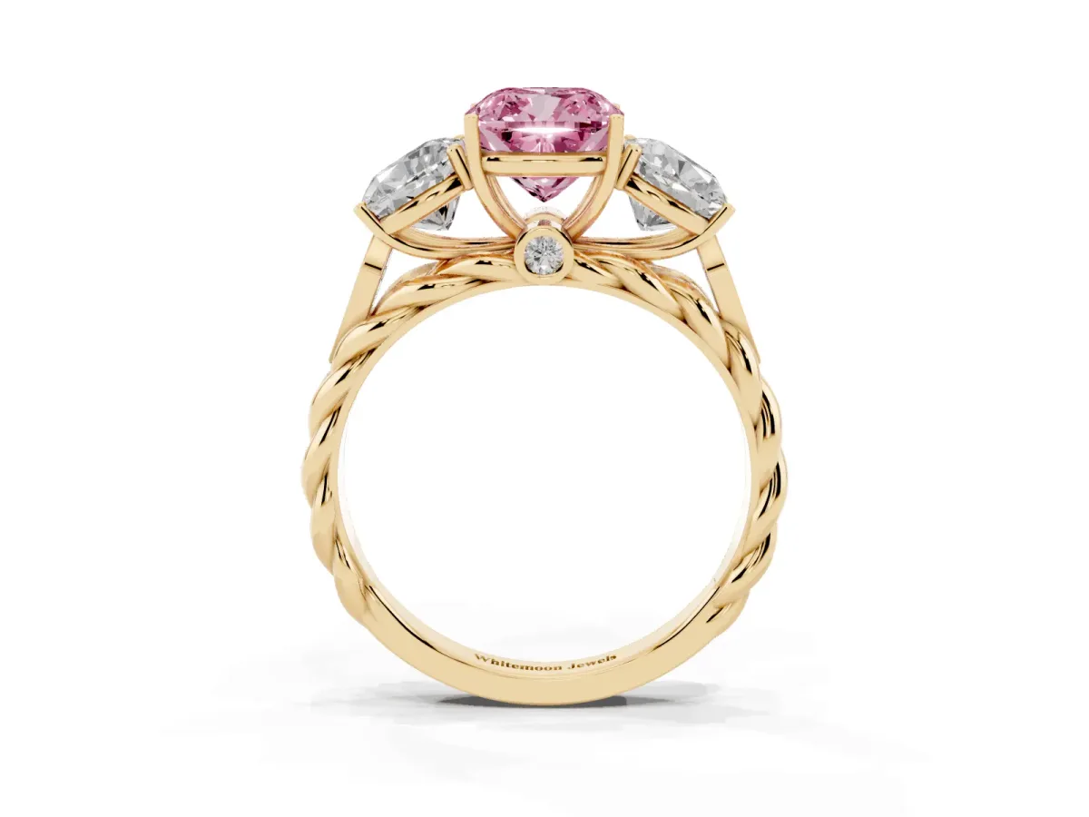 Fancy Pink Three-Stone Cushion Cut Diamond Braided Band Ring with Four-Prong Setting Yellow gold