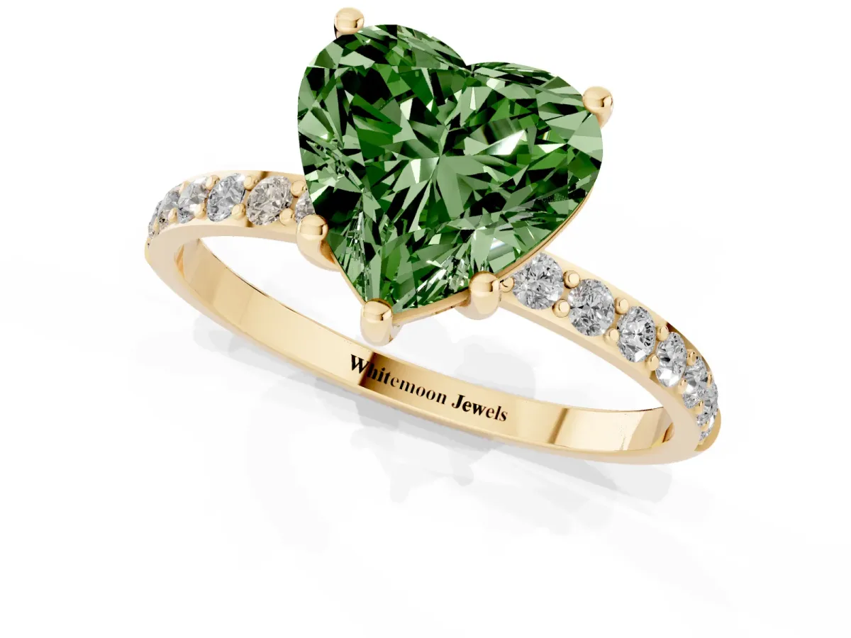 Fancy Green Heart Cut Diamond Solitaire Ring with Round Pavé Shoulders and Prong Setting Yellow gold