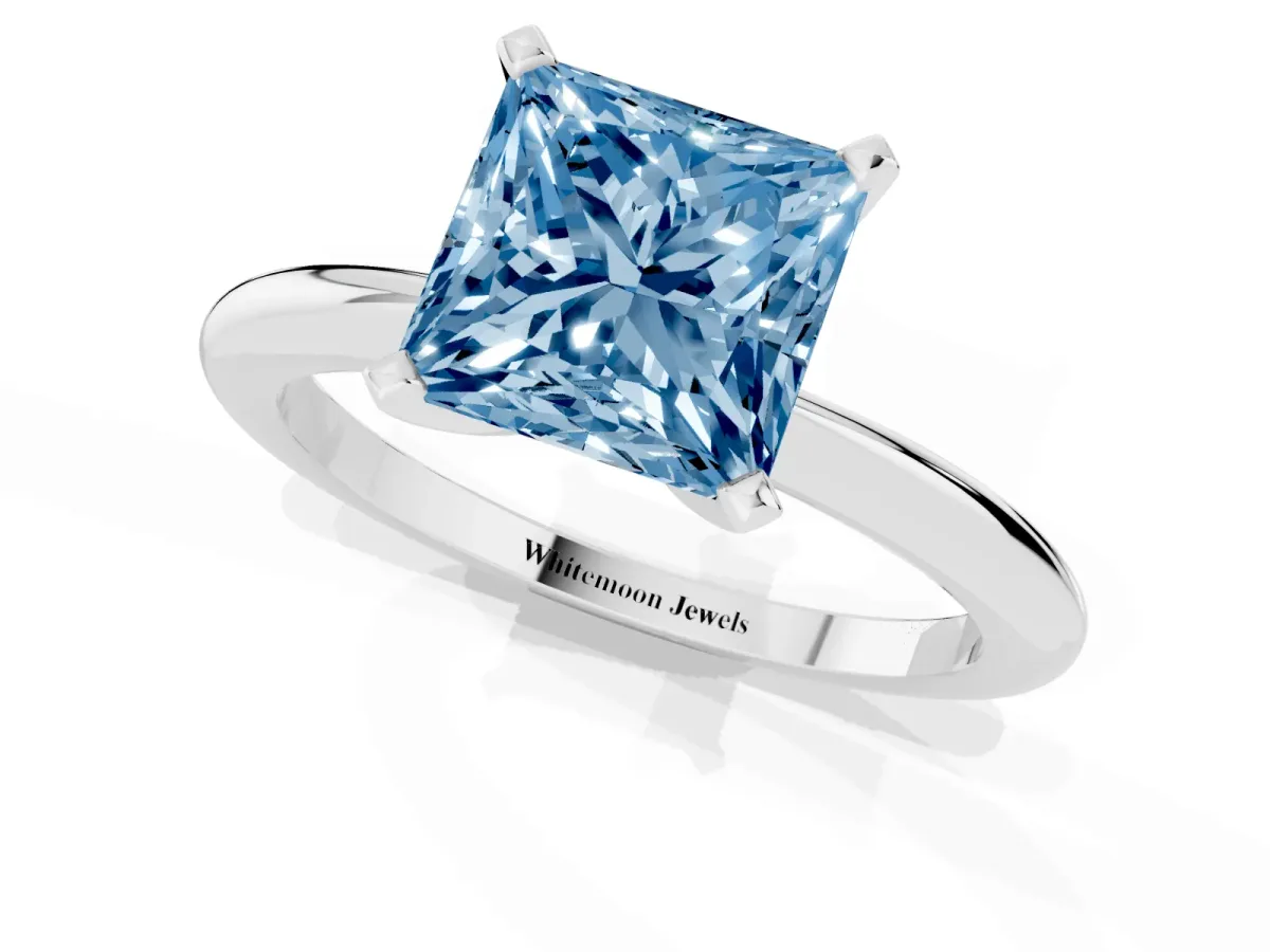 Fancy Blue Princess Cut Diamond Solitaire Ring with Prong Setting and Classic Band Platinum