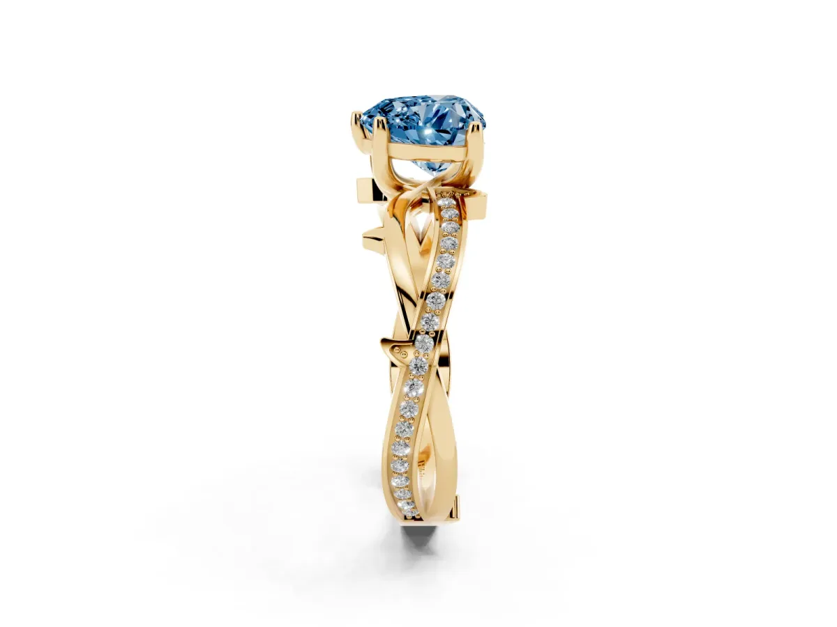 Fancy Blue Heart Cut Solitaire Twist Band with Pavé Accents and Four-Prong Setting Yellow gold