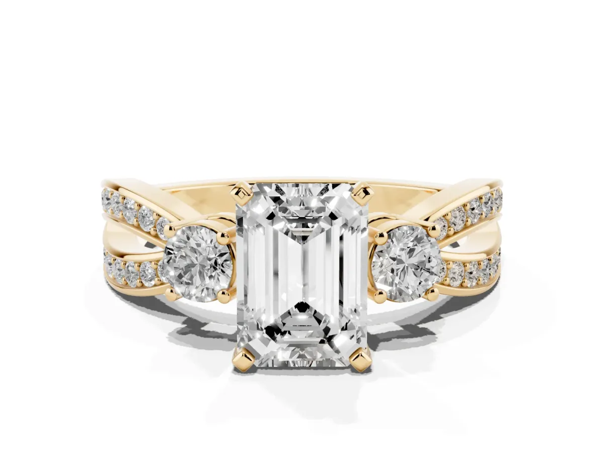 Three-Stone Emerald Cut Cut Diamond Twist Band with Prong Setting Yellow gold
