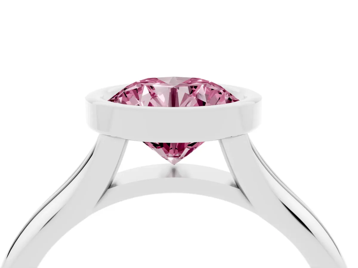 Fancy Pink Bezel Set Round Cut Solitaire Diamond Ring with Smooth Band Silver
