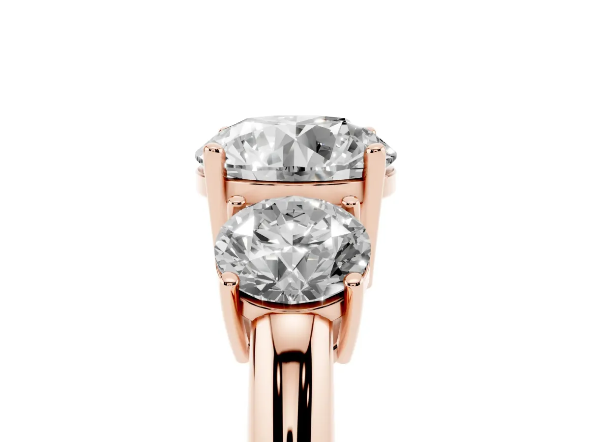 Three-Stone Round Cut Cut Diamond Engagement Ring with Prong Setting on a White Gold Band Rose gold