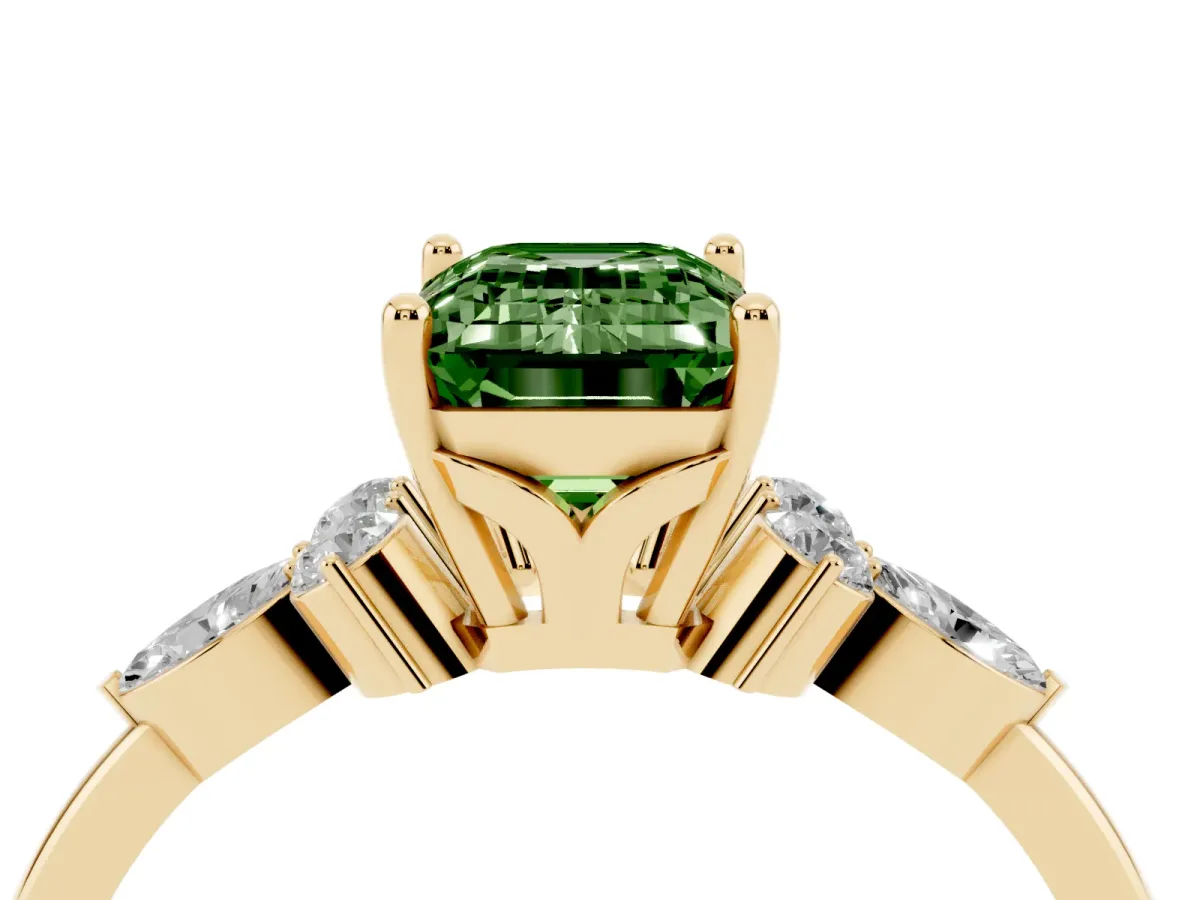 Fancy Green Emerald Cut Brilliant Diamond Solitaire Ring with Pear Side Stones and Four-Prong Setting Yellow gold