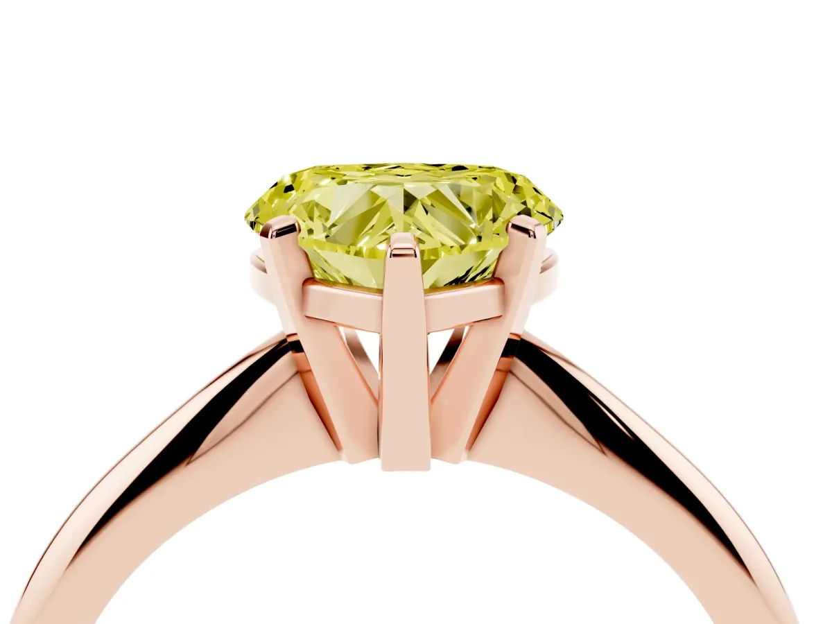 Fancy Yellow Heart Cut Cut Solitaire Ring with Four-Prong Setting on a Classic Band Rose gold