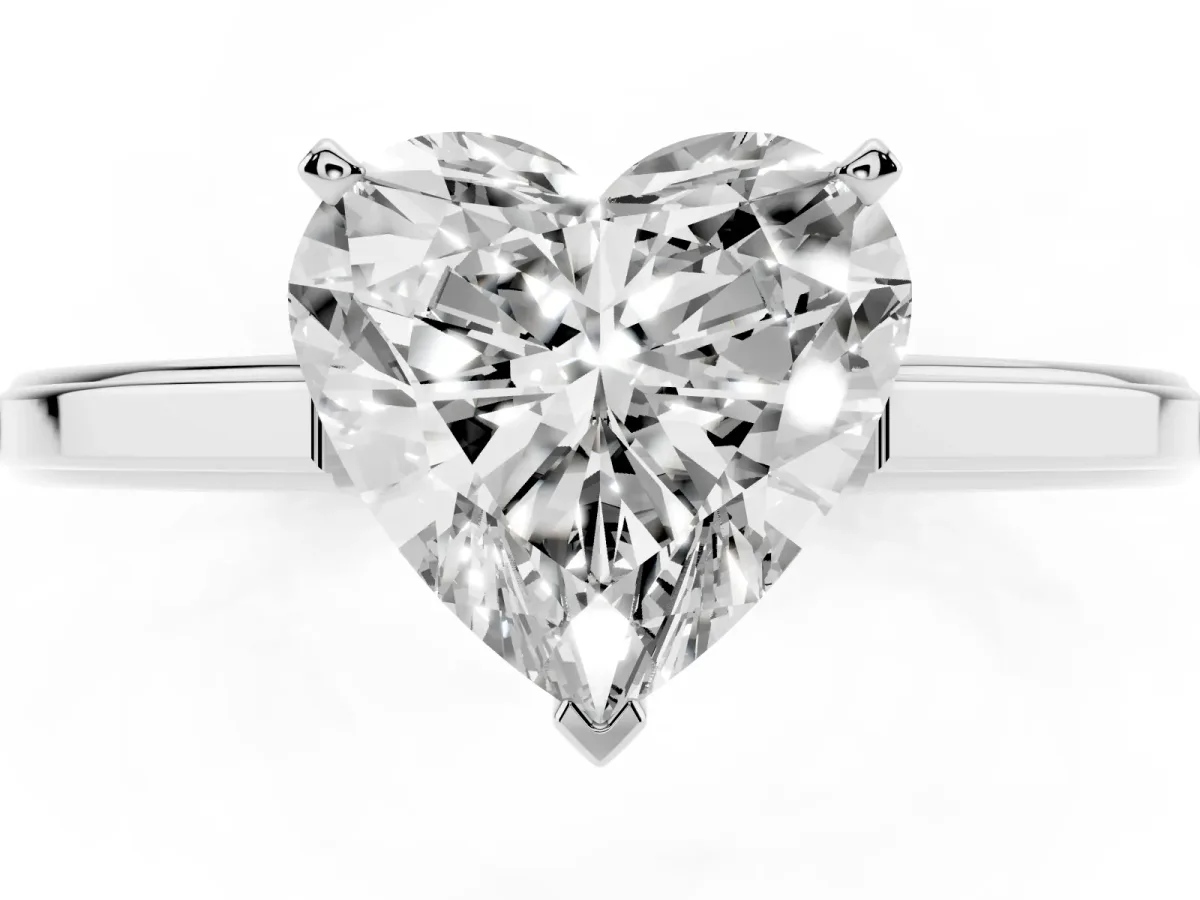 Heart Cut Solitaire Diamond Ring with Four-Prong Setting and Classic Band Silver