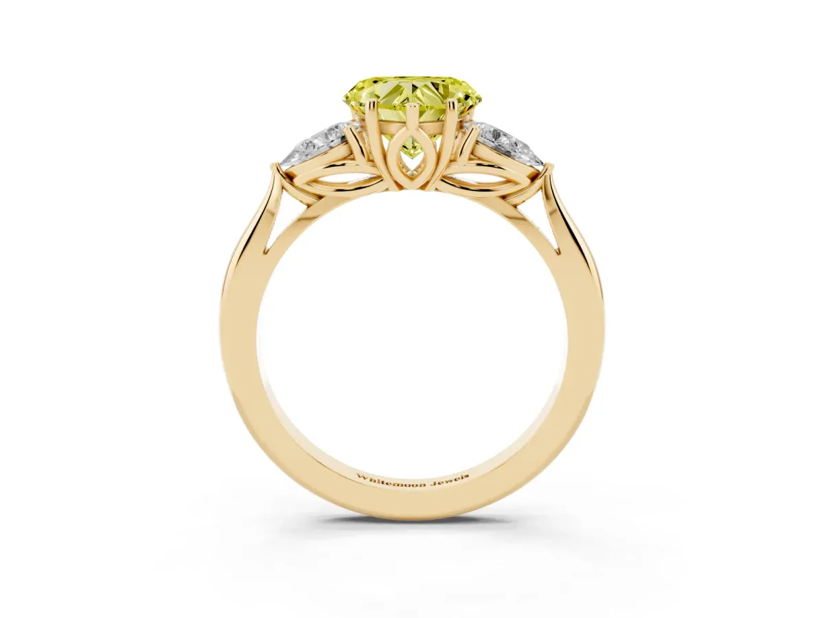 Fancy Yellow Heart Cut Diamond Three-Stone Ring with Pear Side Stones and Prong Setting Yellow gold