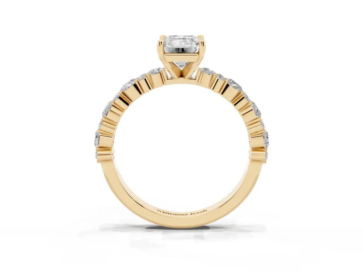 Emerald Cut Diamond Side Stone Solitaire Ring with Round and Four-Prong Setting Yellow gold