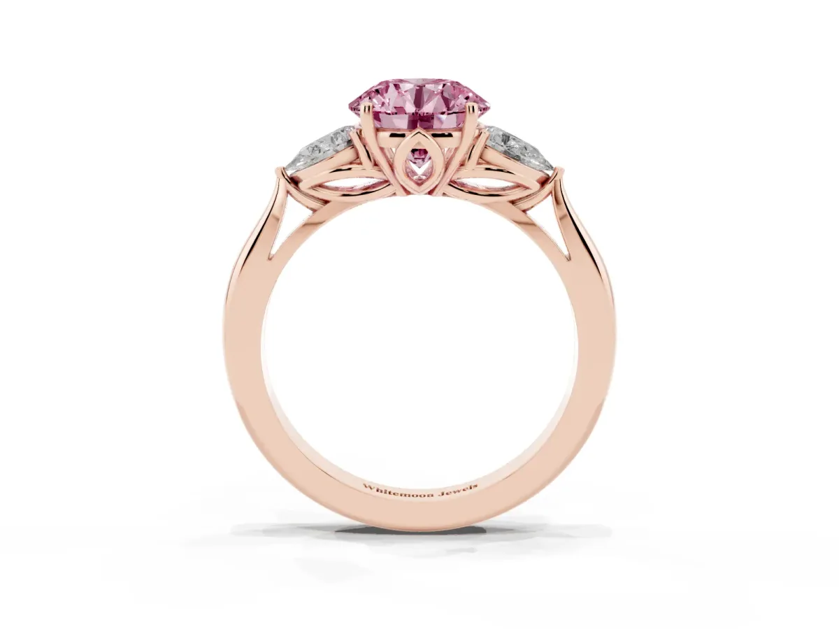 Fancy Pink Three-Stone Round Cut Brilliant Diamond Solitaire Ring with Tapered Band and Four-Prong Setting Rose gold