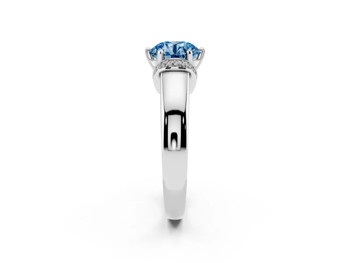 Fancy Blue Round Cut Solitaire Diamond Ring with Pave Band and Six-Prong Setting Silver