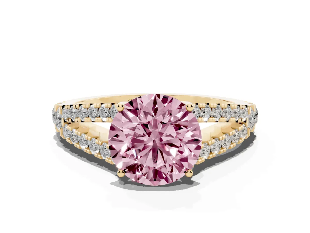 Fancy Pink Round Cut Diamond Split Shank Engagement Ring with Round Pavé and Prong Setting Yellow gold