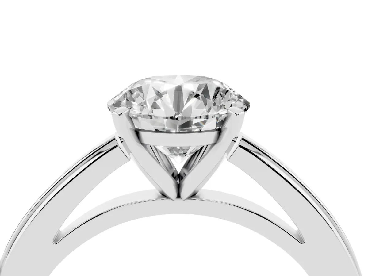 Round Cut Solitaire Diamond Ring with Four-Prong Setting and Classic Band Platinum