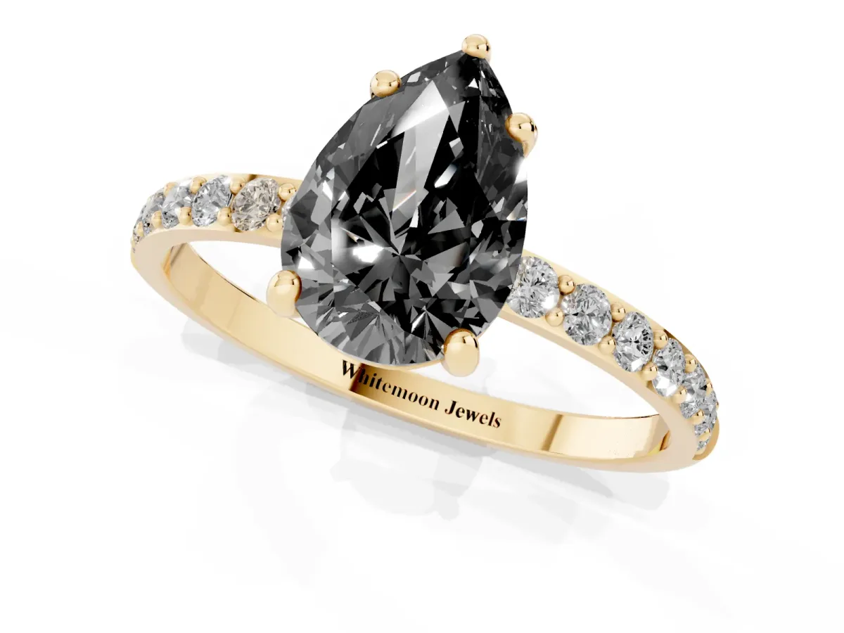 Fancy Black Pear Cut Diamond Solitaire Ring with Round Pavé Band and Prong Setting Yellow gold