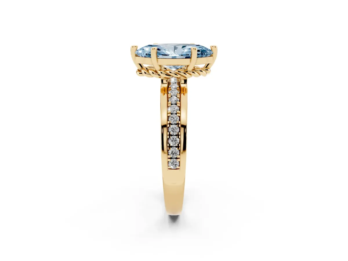 Fancy Blue Marquise Cut Solitaire Diamond Ring with Channel Set Band and Six-Prong Setting Yellow gold