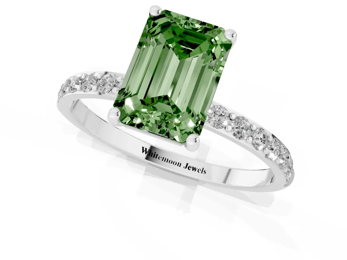 Fancy Green Emerald Cut Diamond Solitaire Ring with Round Pavé Shoulders and Prong Setting Silver