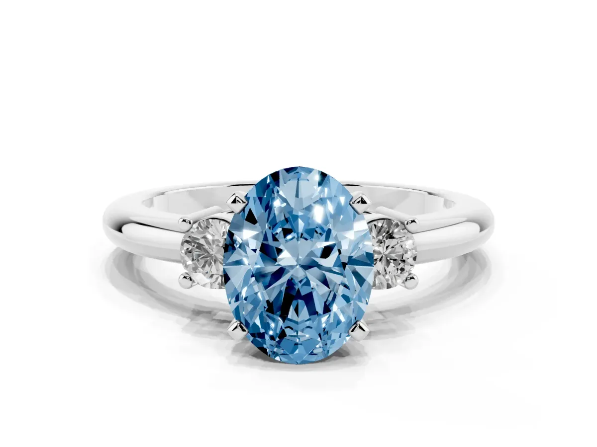 Fancy Blue Three-Stone Oval Cut Cut Diamond Solitaire with Prong Setting and Classic Band Platinum
