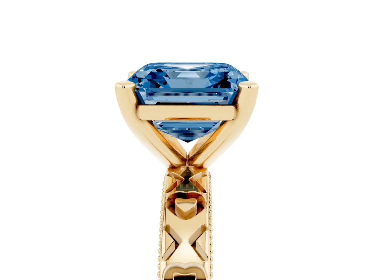 Fancy Blue Asscher Cut Solitaire Diamond Engagement Ring with XO Engraved Band and Four-Prong Setting Yellow gold