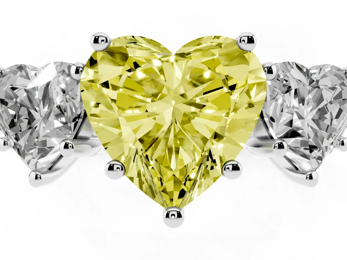 Fancy Yellow Three-Stone Heart Cut Diamond Ring with Round Pavé Band and Prong Setting Silver