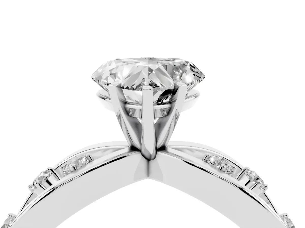 Heart Cut Cut Solitaire Diamond with Side Stones on Criss-Cross Band and Four-Prong Setting Silver